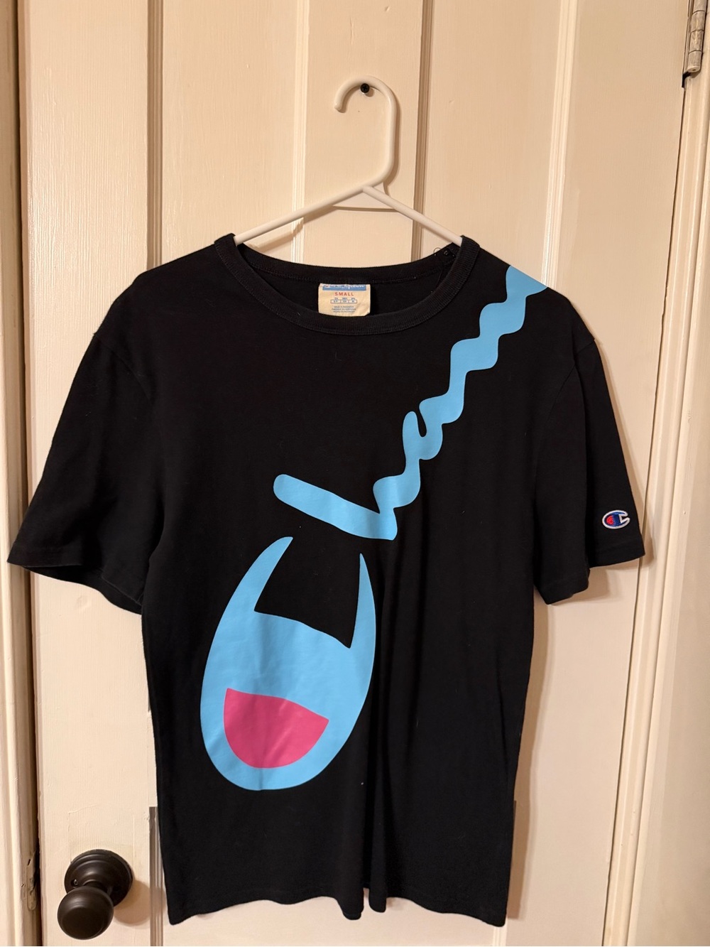 Champion Black Tee with Blue & Pink Graphic